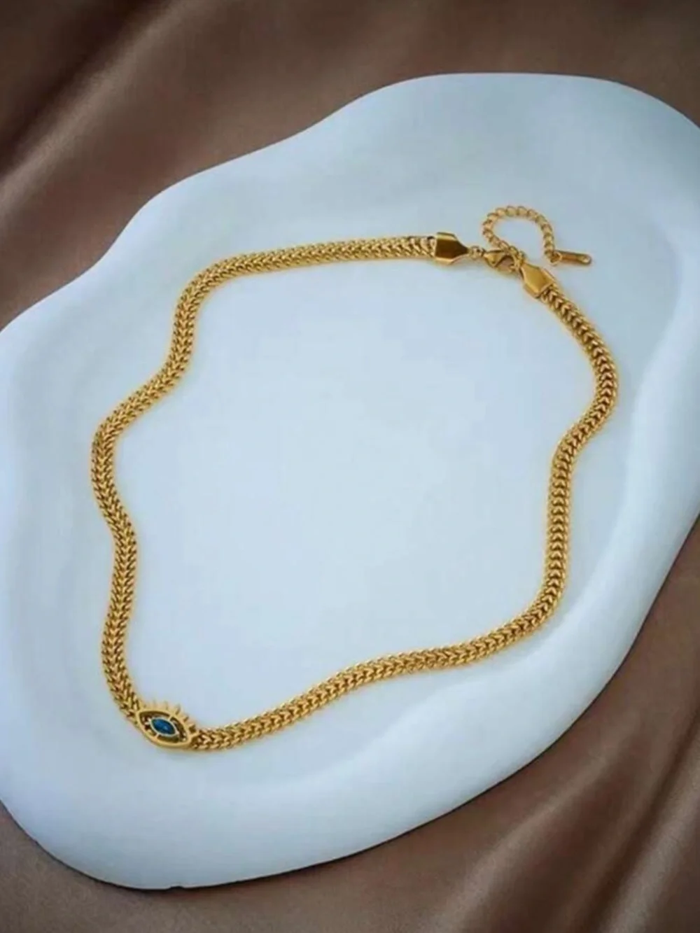 Sorel Gold Chain Choker with Blue Eye Charm